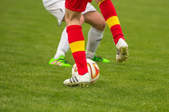 dribbling soccer ball