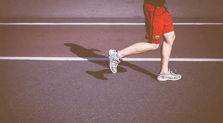 athlete in Barcelona shorts running track