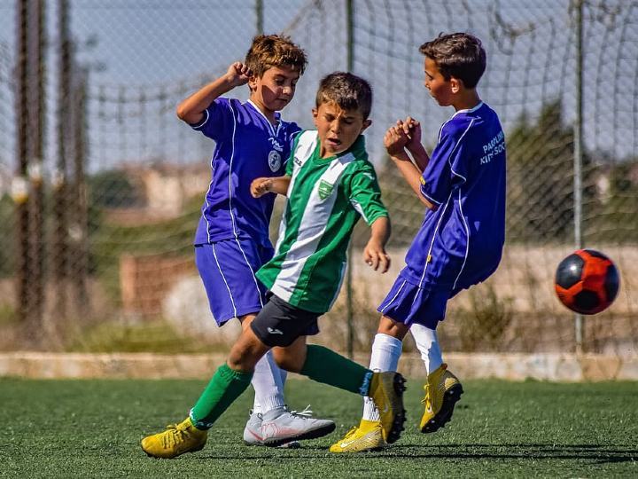 boys playing a soccer game