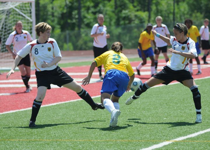 women playing a soccer game