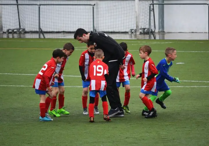 soccer-coach-trains-and-talks-to-his-youth-team