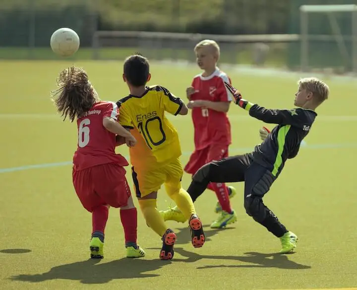 soccer-youth-players-defend-against-an-opponent