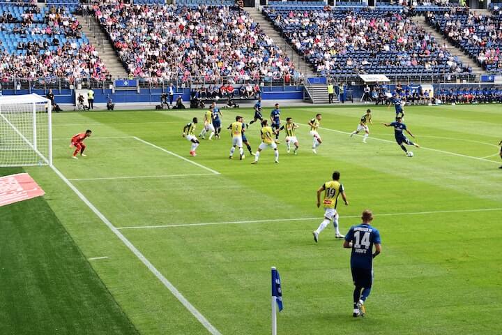 soccer-4-3-1-2-formation teams-battle-for-possession-as-attacking-team-hunts-for-a-goal-during-a-soccer-match