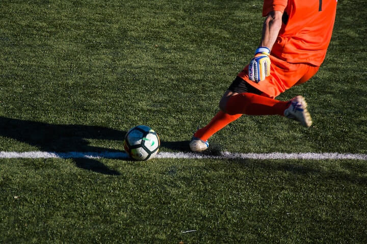 soccer-field-lines-and-markings goalkeeper-takes-a-goal-kick-during-a-soccer-match