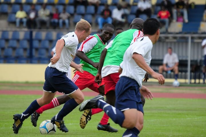 soccer-player-looks-to-dribble-past-defenders-during-the-game