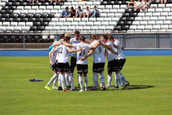 soccer team gets ready to start the match